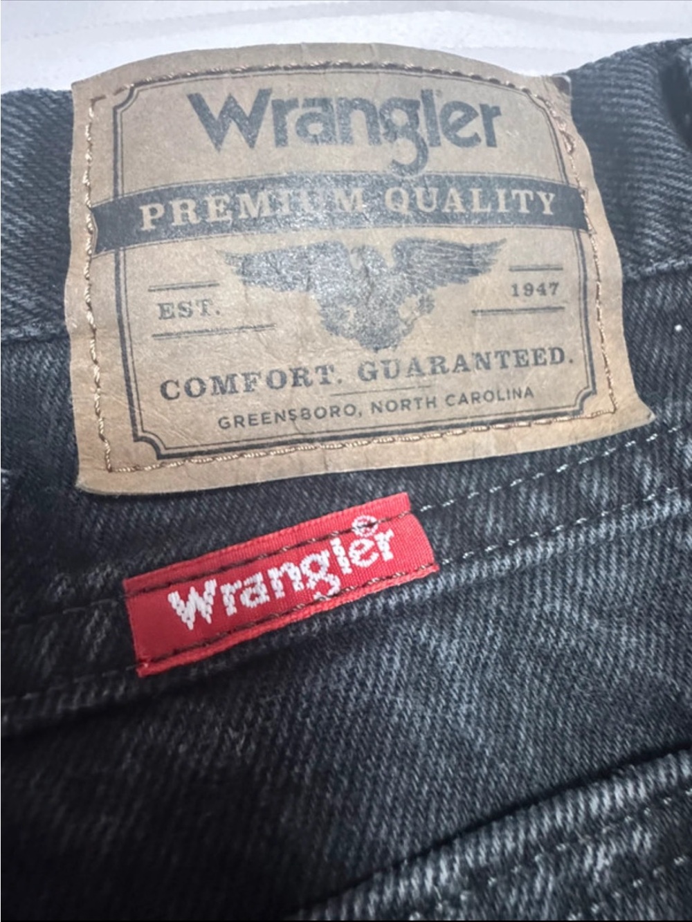 Wrangler Men’s Straight Jeans in Black with Red Logo Tab